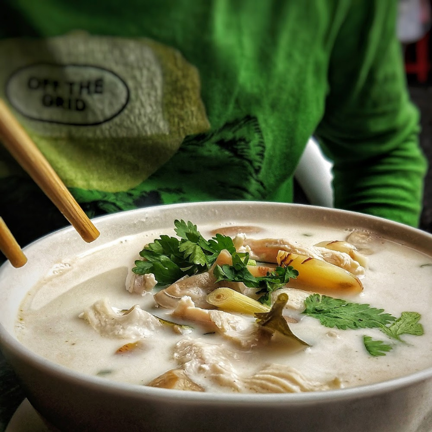 Eating Tom Kha Gai Thai cuisine tom ka gai chicken coconut soup
